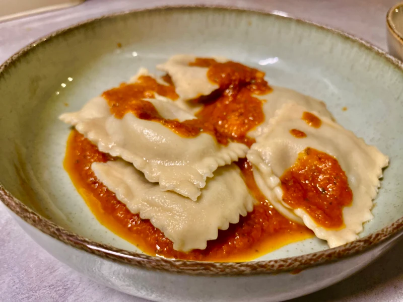 Caramelised red onion and goats cheese ravioli