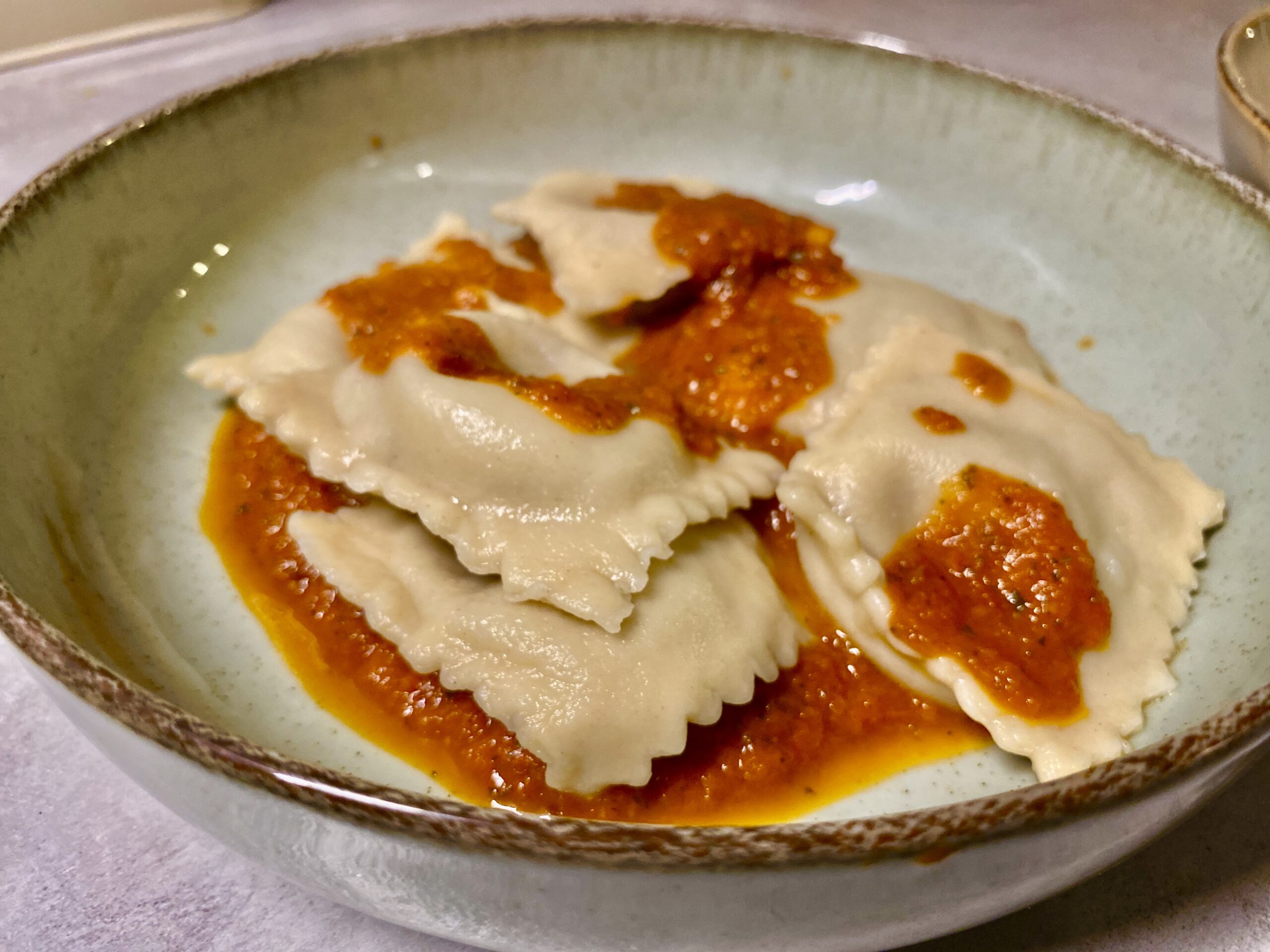 Caramelised red onion and goats cheese ravioli